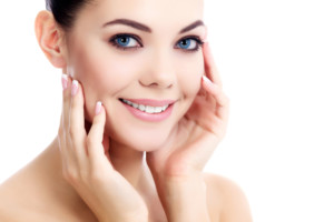 female with fresh clear skin, white background emale with fresh clear skin